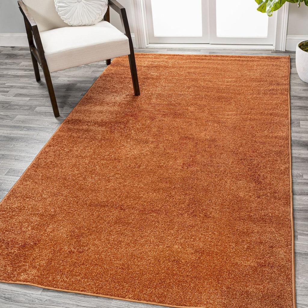 JONATHAN Y Tumbling Solid Low-Pile Area Rug