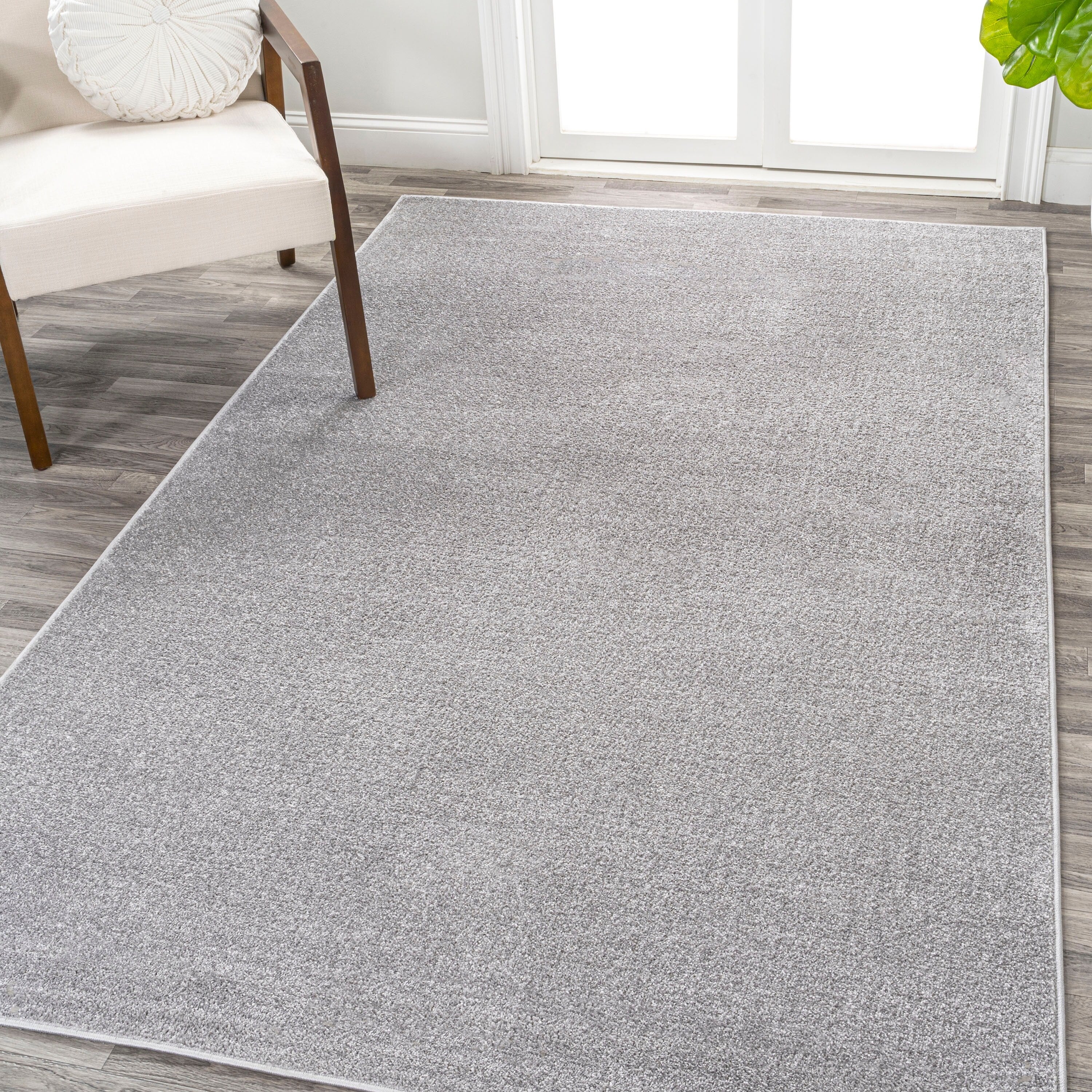 JONATHAN Y Tumbling Solid Low-Pile Area Rug