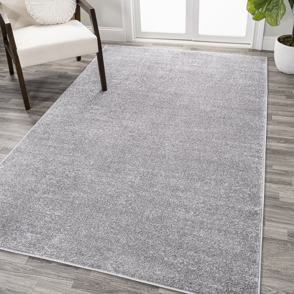 JONATHAN Y Tumbling Solid Low-Pile Area Rug