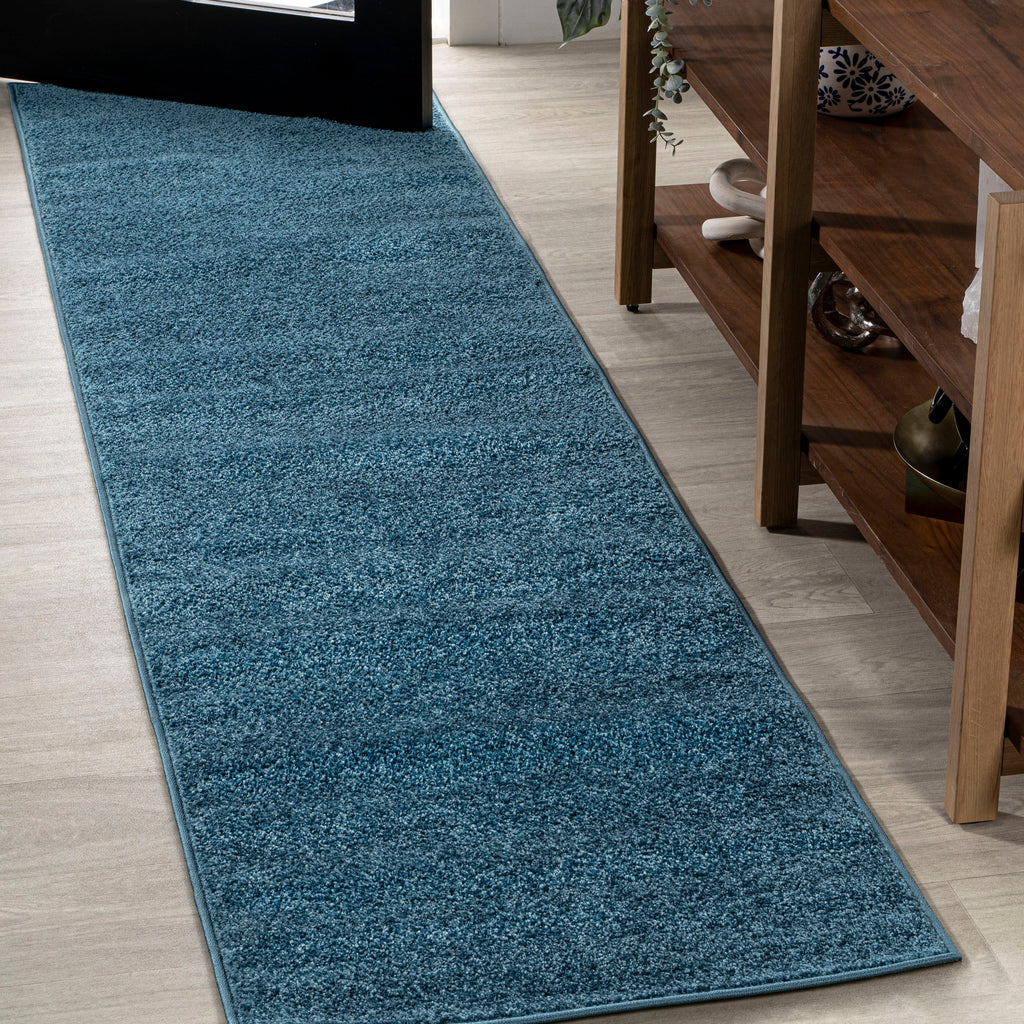 JONATHAN Y Tumbling Solid Low-Pile Area Rug