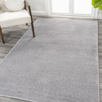 JONATHAN Y Tumbling Solid Low-Pile Area Rug