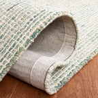 SAFAVIEH Handmade Abstract Katija Modern Wool Rug