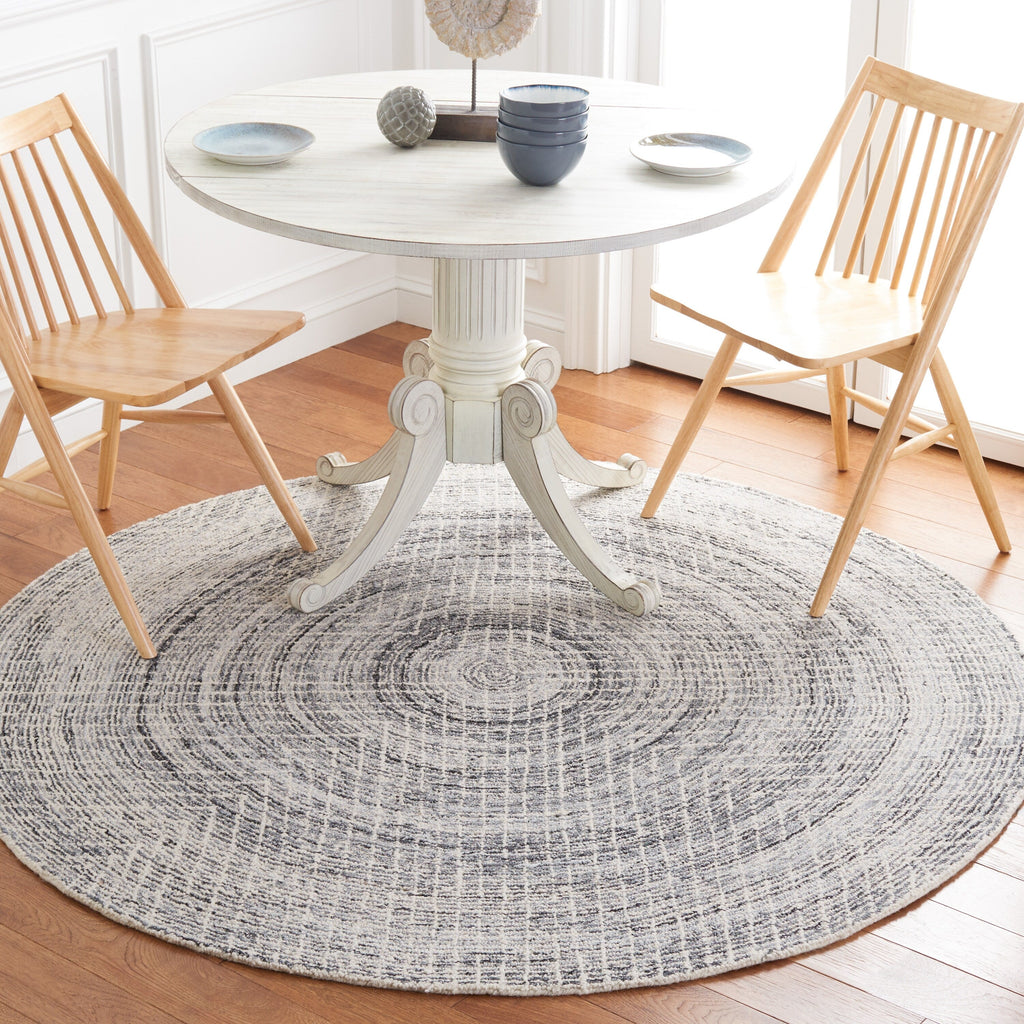 SAFAVIEH Handmade Abstract Maggy Modern Wool Rug