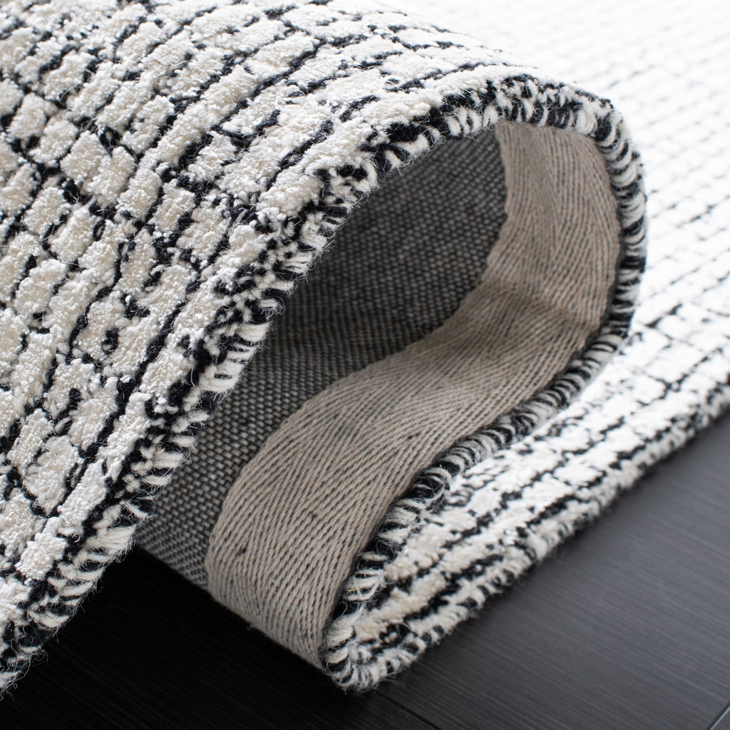 SAFAVIEH Handmade Abstract Marikka Modern Viscose Rug