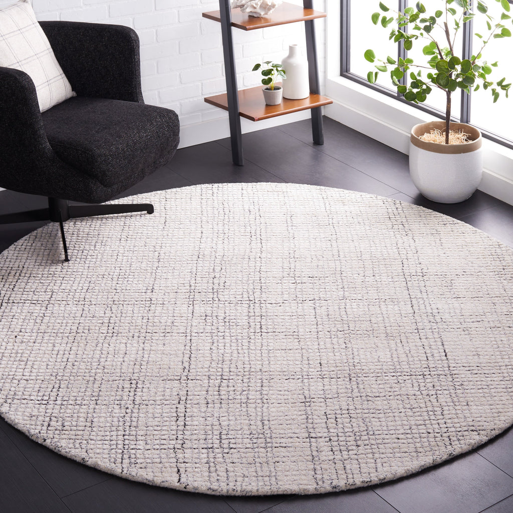 SAFAVIEH Handmade Abstract Marikka Modern Viscose Rug