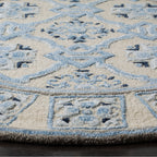 SAFAVIEH Handmade Bella Rodica Modern Floral Wool Rug