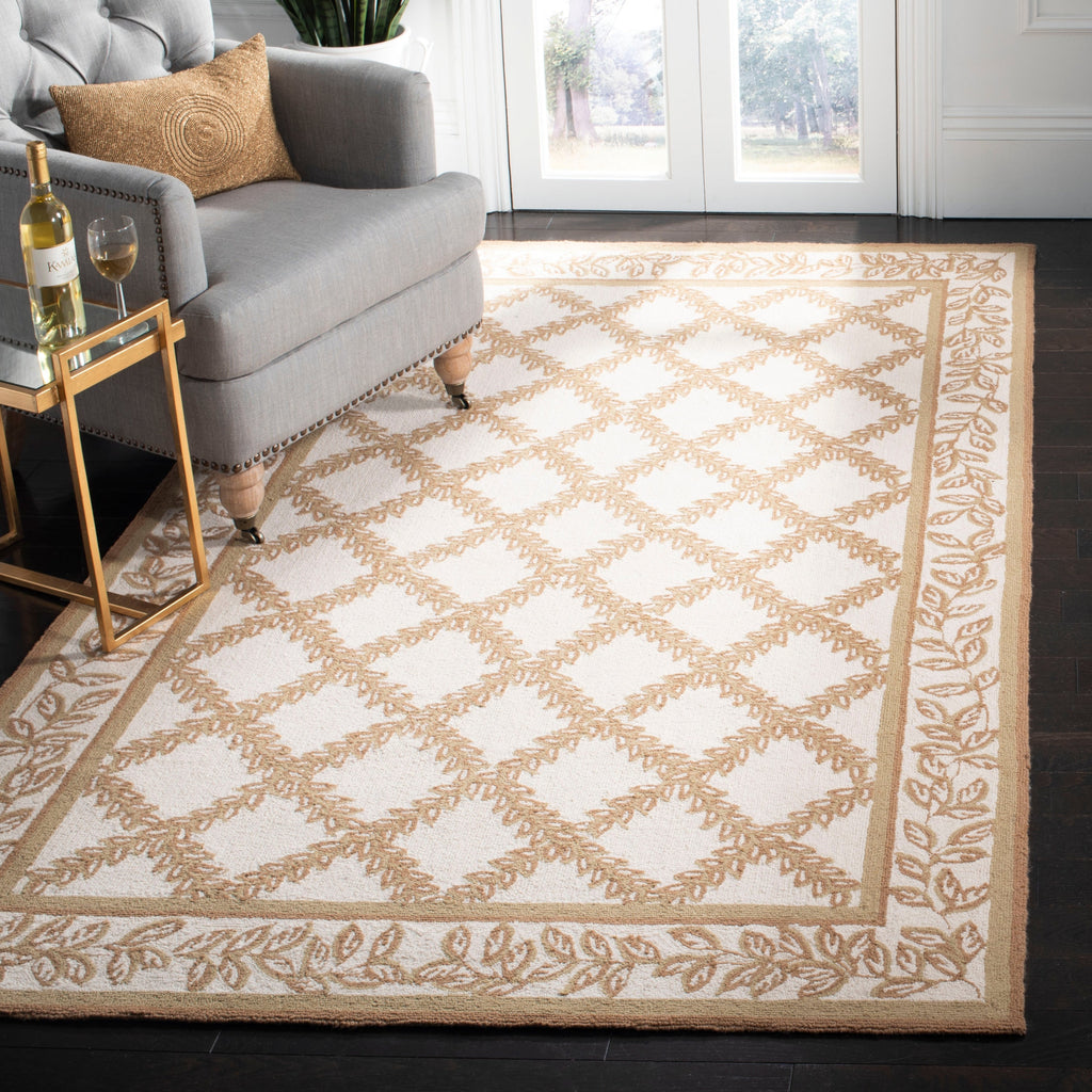 SAFAVIEH Handmade Chelsea Sunstripe Trellis French Country Wool Rug
