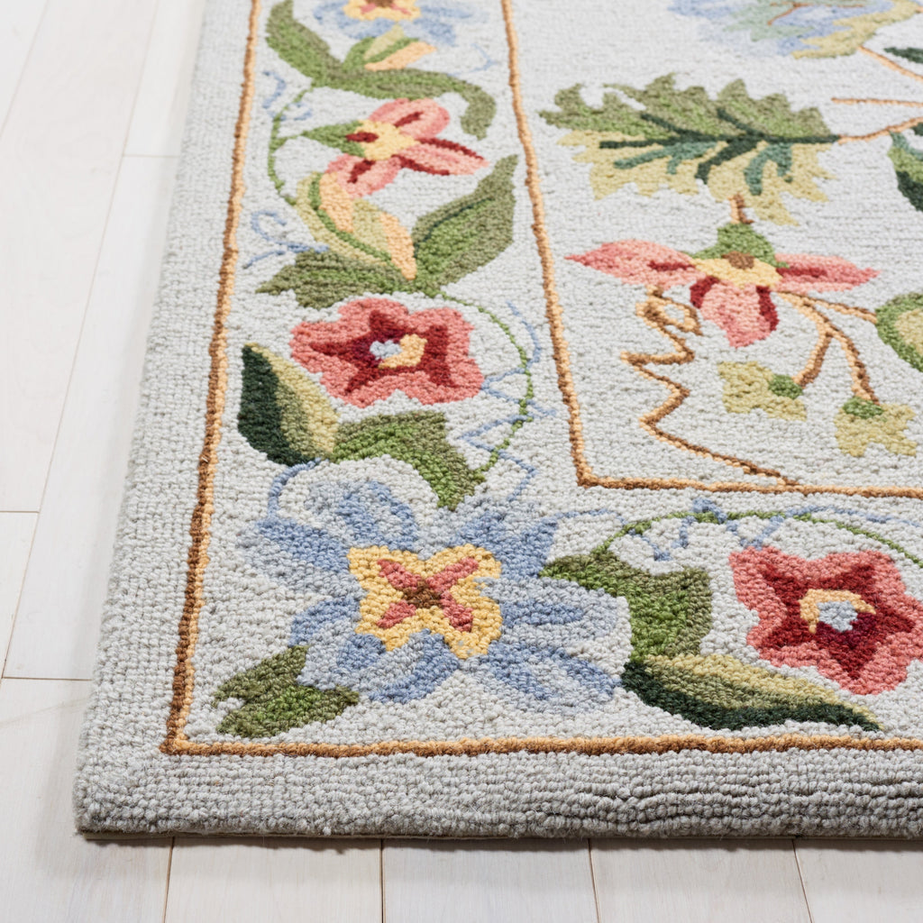 SAFAVIEH Handmade Chelsea Yauhenia French Country Floral Wool Rug