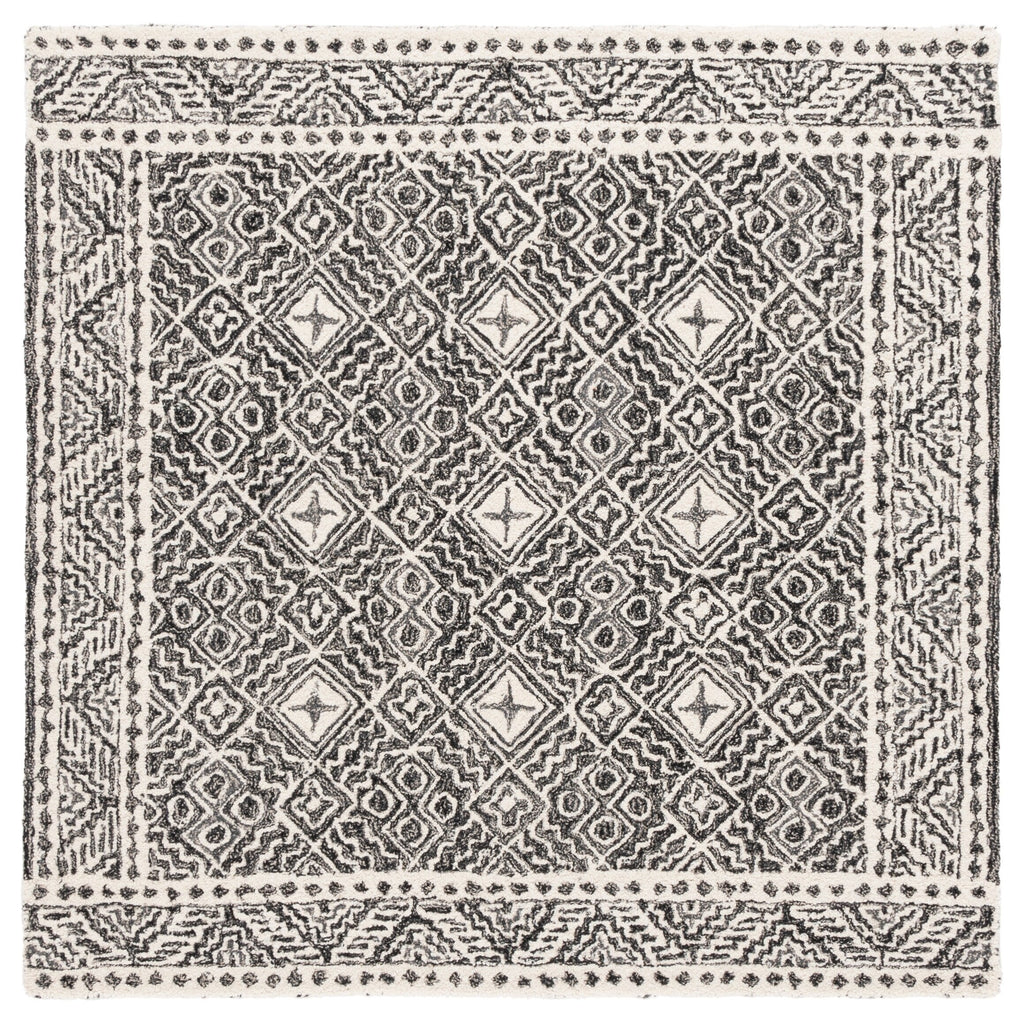 SAFAVIEH Handmade Micro-Loop Lutetia Wool Rug