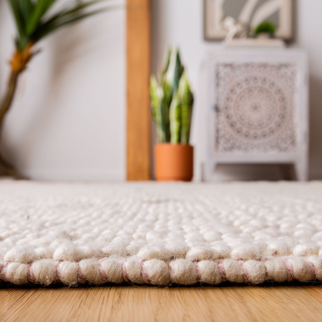 SAFAVIEH Handmade Natura Estel Wool Fringe Rug