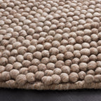 SAFAVIEH Handmade Natura Gonnie Wool Rug