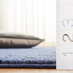 SAFAVIEH Handmade Natura Gonnie Wool Rug