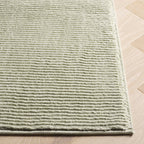 SAFAVIEH Revive Avie Solid Rug