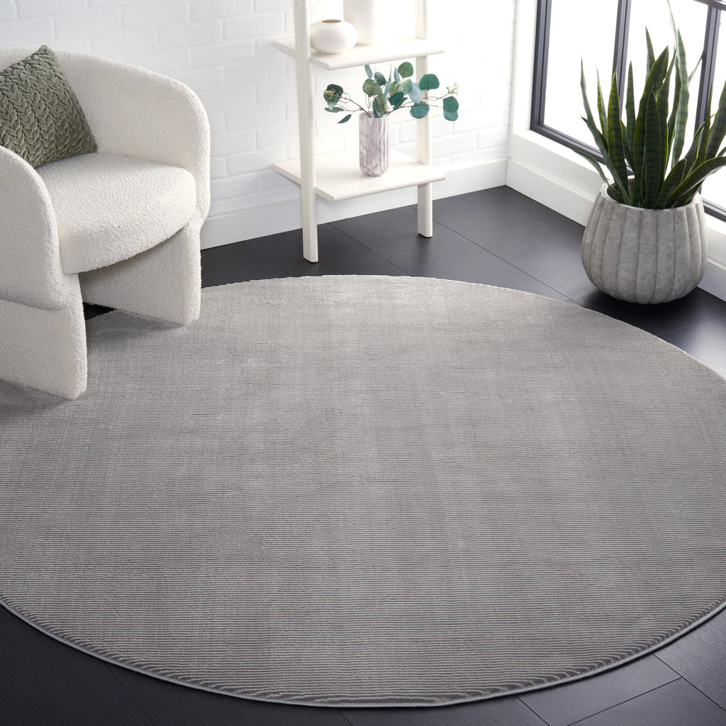 SAFAVIEH Revive Avie Solid Rug