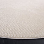 SAFAVIEH Revive Avie Solid Rug