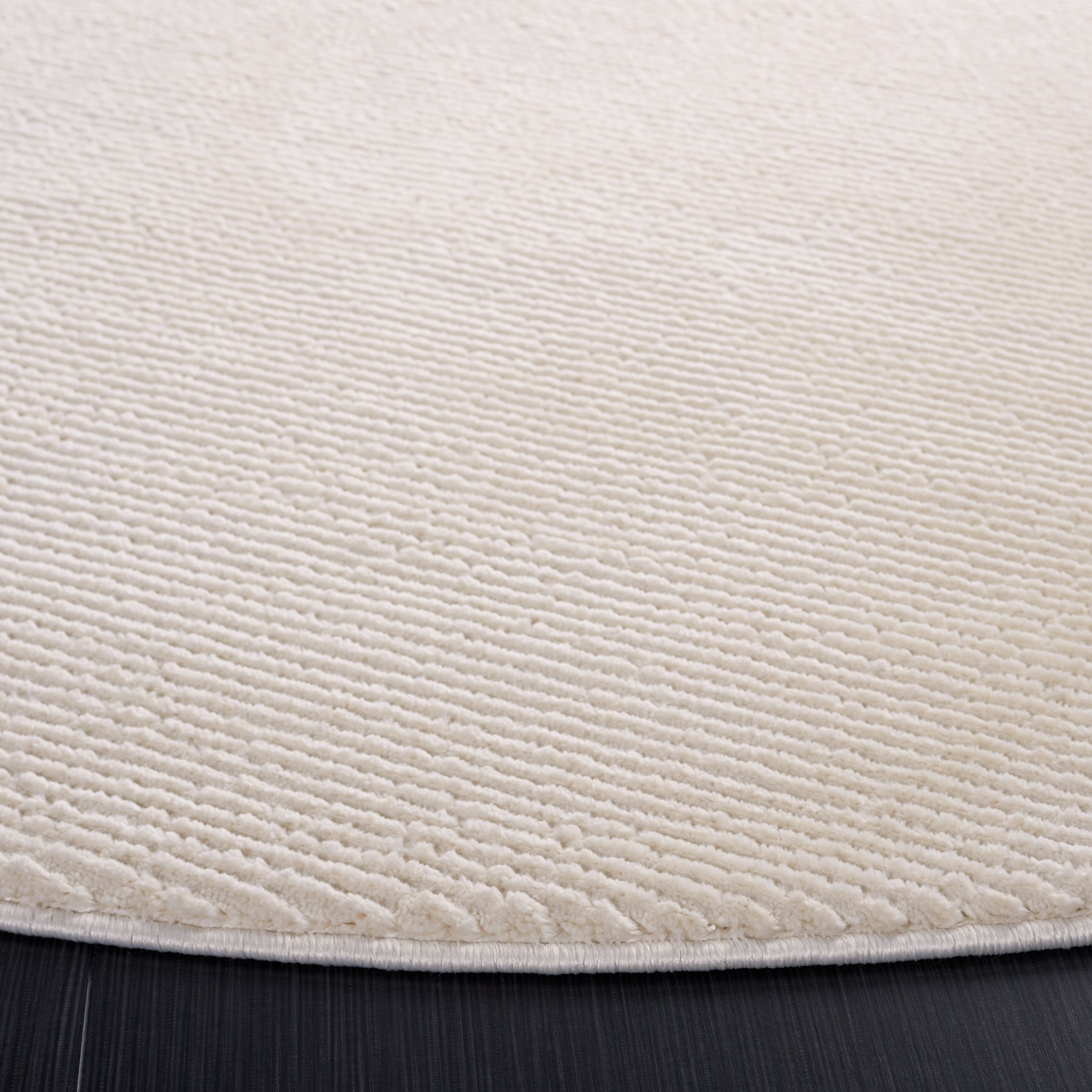 SAFAVIEH Revive Avie Solid Rug