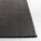 SAFAVIEH Revive Avie Solid Rug