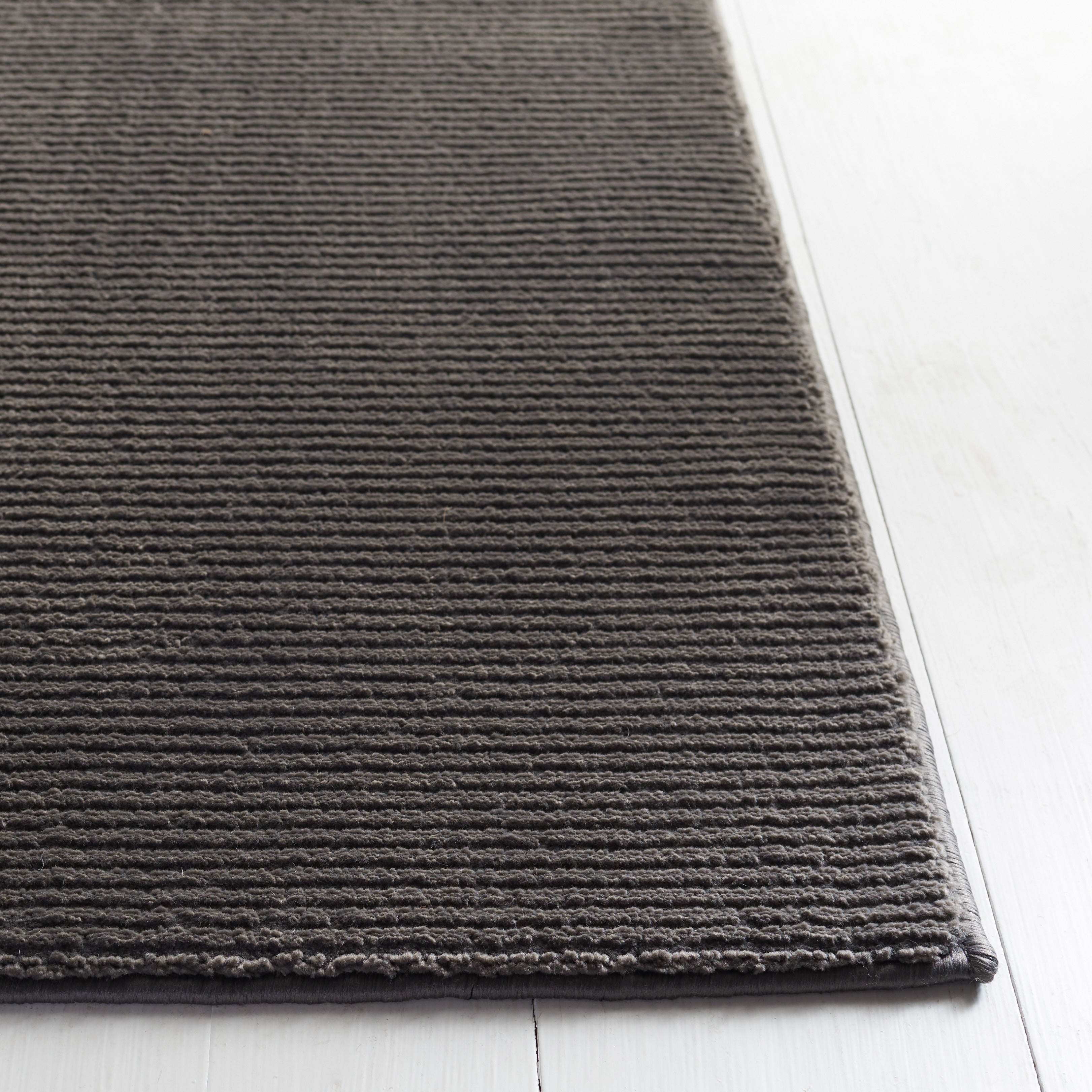 SAFAVIEH Revive Avie Solid Rug