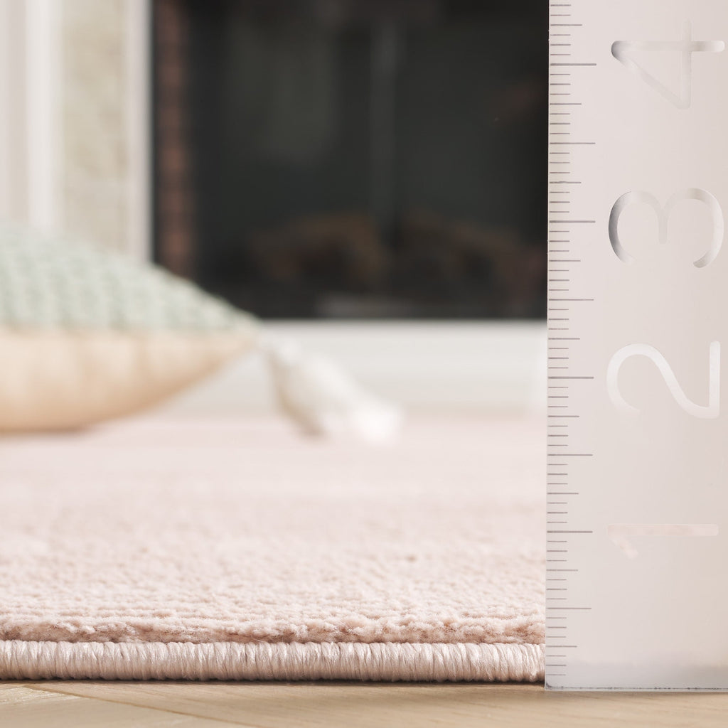 SAFAVIEH Revive Avie Solid Rug