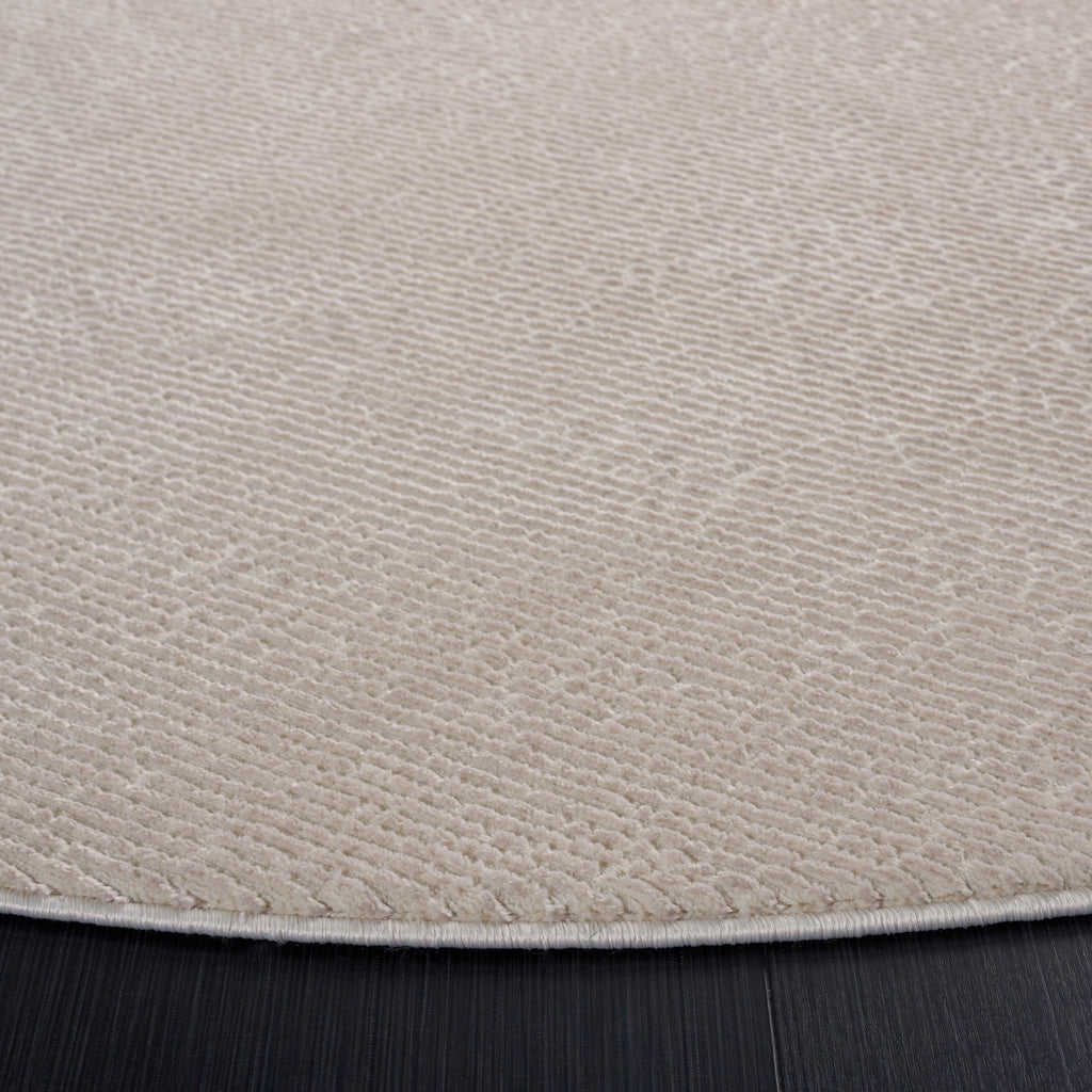SAFAVIEH Revive Avie Solid Rug