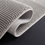 SAFAVIEH Revive Avie Solid Rug